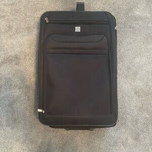 Black suitcase and duffle